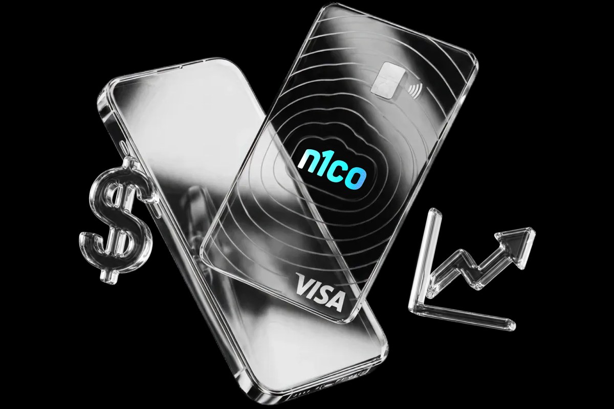 Teléfono y tarjeta n1co de vidrio con un signo de dólar y una flecha que sube